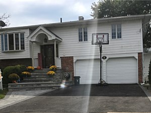 boral echo ridge country ledgestone stoop bluestone edging brick gray grey walkway asphalt driveway with border merrick high ranch planter box